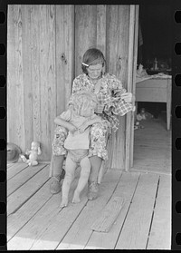 [Untitled photo, possibly related to: Grandmother and child, Southeast Missouri Farms] by Russell Lee