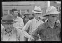 [Untitled photo, possibly related to: Farmers standing in street, Caruthersville, Missouri] by Russell Lee