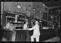 [Untitled photo, possibly related to: Saloon, Decatur Street, New Orleans, Louisiana] by Russell Lee