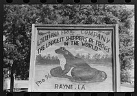 Sign of frog company, Rayne, Louisiana by Russell Lee