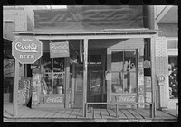 [Untitled photo, possibly related to: Storefront, Altheimer, Arkansas] by Russell Lee