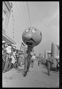 [Untitled photo, possibly related to: Parade of the balloons, National Rice Festival, Crowley, Louisiana] by Russell Lee
