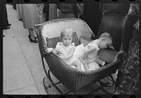 Two children in buggy, National Rice Festival, Crowley, Louisiana by Russell Lee