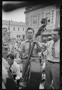 Bass viol player, Cajun band contest, National Rice Festival, Crowley, Louisiana by Russell Lee