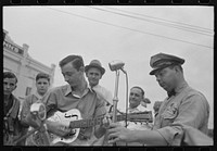 [Untitled photo, possibly related to: Cajun Hawaiian guitar player, National Rice Festival, Crowley, Louisiana] by Russell Lee