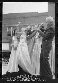 [Untitled photo, possibly related to: Introducing the Queen to the radio audience, National Rice Festival, Crowley, Louisiana] by Russell Lee
