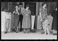 Spectators waiting for parade, National Rice Festival, Crowley, Louisiana by Russell Lee