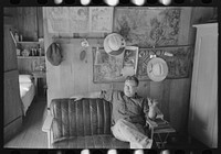 [Untitled photo, possibly related to: Junkyard owner, near Abbeville, Louisiana] by Russell Lee