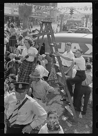 [Untitled photo, possibly related to: Detail of crowd listening to Cajun band contest, National Rice Festival, Crowley, Louisiana] by Russell Lee