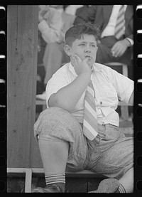 Young boy, spectator at ceremonies, state fair, Donaldsonville, Louisiana by Russell Lee