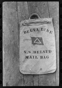 Mail bag on dock, Pilottown, Louisiana by Russell Lee