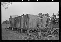 [Untitled photo, possibly related to: Side wall of old house dating from early nineteenth century showing details of construction. Showing use of mud and moss as filling agent. Near Edgard, Louisiana] by Russell Lee