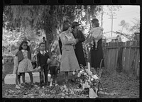 [Untitled photo, possibly related to: Children of es dressed in Sunday best for ceremonies, memorial services. All Saint's Day, New Roads, Louisiana] by Russell Lee