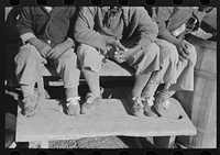 Detail of clothes of sharecropping children who will be resettled on Transylvania Project, Louisiana. Note the cloth shoelaces by Russell Lee