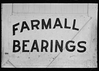 Sign showing need for replacing parts in tractors, Robstown, Texas by Russell Lee
