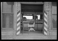 Barbershop, San Antonio, Texas, Mexican section by Russell Lee