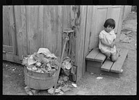 [Untitled photo, possibly related to: Mexican mother and child in doorway, San Antonio, Texas] by Russell Lee