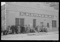 [Untitled photo, possibly related to: Pecan shellers eating lunch, San Antonio, Texas] by Russell Lee