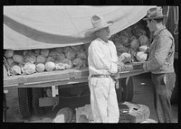 [Untitled photo, possibly related to: Vegetable peddlers in open air market, San Antonio, Texas] by Russell Lee