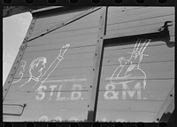 Fascism and Uncle Sam sign on box car, Crystal City, Texas by Russell Lee