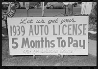 Auto license in Texas can be bought on the installment plan, San Antonio, Texas by Russell Lee