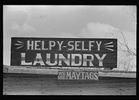 Sign, Quemado, Texas: Helpy-Selfy Laundry--We Use Maytags by Russell Lee