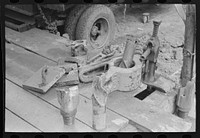 [Untitled photo, possibly related to: Oil field workers talking together with bits in front of them, Kilgore, Texas] by Russell Lee