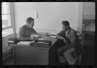 [Untitled photo, possibly related to: FSA (Farm Security Administration) client talking to supervisor, Sabine Farms, Marshall, Texas] by Russell Lee