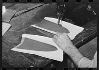 [Untitled photo, possibly related to: Sewing lining in piece of upper of boot. Bootmaking shop, Alpine, Texas] by Russell Lee