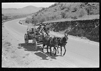 Chuck and bedroll wagon of the tank gang on the highway. Near Marfa, Texas by Russell Lee