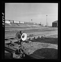 [Untitled photo, possibly related to: Chicago, Illinois. Train of cars going over the hump at a Chicago and Northwestern Railroad yard]. Sourced from the Library of Congress.