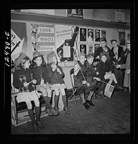 Chicago (north), Illinois. Children gathering in Office of Civilian Defense block headquarters to participate in a flag dedication ceremony. Sourced from the Library of Congress.