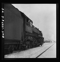 [Untitled photo, possibly related to: Freight operations on the Indiana Harbor Belt Railroad between Chicago, Illinois and Hammond, Indiana. The engine crew brings the engine from the roundhouse and waits for orders for the day]. Sourced from the Library of Congress.