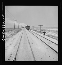 Freight operations on the Indiana Harbor Belt railroad between Chicago, Illinois and Hammond, Indiana. On their way back, the crew stops twenty minutes for dinner. Sourced from the Library of Congress.