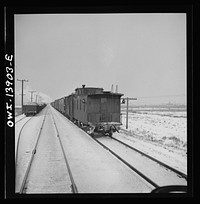 [Untitled photo, possibly related to: Freight operations on the Indiana Harbor Belt railroad between Chicago, Illinois and Hammond, Indiana. On their way back, the crew stops twenty minutes for dinner]. Sourced from the Library of Congress.