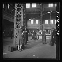 [Untitled photo, possibly related to: Chicago, Illinois. Member of the Women's Army Auxiliary Corps waiting for a train in Union Station]. Sourced from the Library of Congress.