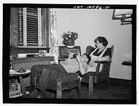 Blue Island, Illinois. Listening to a radio program in the Senise home. Sourced from the Library of Congress.