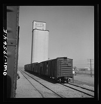 Capron, Oklahoma. A grain elevator along the Atchison, Topeka, and Santa Fe Railroad between Wellington, Kansas and Waynoka, Oklahoma. Sourced from the Library of Congress.