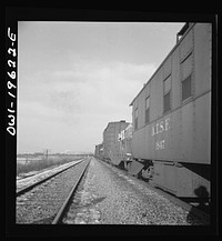 [Untitled photo, possibly related to: Baring, Missouri. A train stopping for coal and water along the Atchison, Topeka, and Santa Fe Railroad between Fort Madison, Iowa and Marceline, Missouri]. Sourced from the Library of Congress.