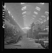 [Untitled photo, possibly related to: Topeka, Kansas. A general view of a part of the locomotive shops of the Atchison, Topeka, and Santa Fe Railroad]. Sourced from the Library of Congress.
