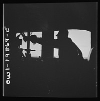 [Untitled photo, possibly related to: Kiowa, Kansas. Engineer B. F. Hale in the cab of his engine on the Atchison, Topeka, and Santa Fe Railroad between Wellington, Kansas and Waynoka, Oklahoma]. Sourced from the Library of Congress.