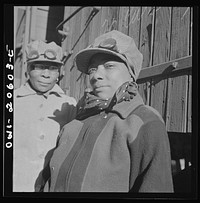 Clovis, New Mexico. Abbie Caldwell, employed in the Atchison, Topeka and Santa Fe Railroad yard to clean out the potash cars. Mrs. Caldwell's husband works in the roundhouse and her son is in the Army. Sourced from the Library of Congress.