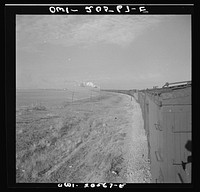 [Untitled photo, possibly related to: Dawn, Texas. Crossing Texas wheat country along the Atchison, Topeka, and Santa Fe Railroad between Amarillo, Texas and Clovis, New Mexico]. Sourced from the Library of Congress.