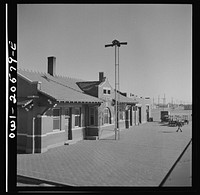 Hereford, Texas. Passing the depot on the Atchison, Topeka, and Santa Fe Railroad between Amarillo, Texas and Clovis, New Mexico. Sourced from the Library of Congress.