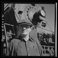 Vaughn, New Mexico. Conductor Ennis O'Niell of Clovis, New Mexico, who was about to leave on the return trip. Sourced from the Library of Congress.