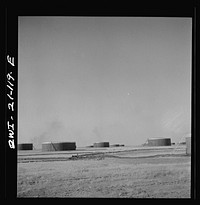 Pampa (vicinity), Texas. An oil storage tank along the Atchison, Topeka and Santa Fe Railroad between Canadian and Amarillo, Texas. Sourced from the Library of Congress.