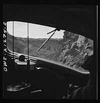 Williams, Arizona. On the Atchison, Topeka and Santa Fe Railroad between Winslow and Seligman, Arizona, going around a curve in the mountains. Sourced from the Library of Congress.