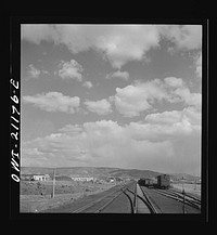 Grants, New Mexico. Going through the town on the Atchison, Topeka and Santa Fe Railroad between Belen and Gallup, New Mexico. Sourced from the Library of Congress.