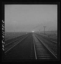 Gallup, New Mexico. A train on the Atchison, Topeka and Santa Fe Railroad between Belen and Gallup, New Mexico. Sourced from the Library of Congress.
