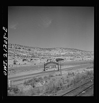 Crossing the Arizona-New Mexico state line along the Atchison, Topeka and Santa Fe Railroad between Gallup, New Mexico and Winslow, Arizona. Sourced from the Library of Congress.
